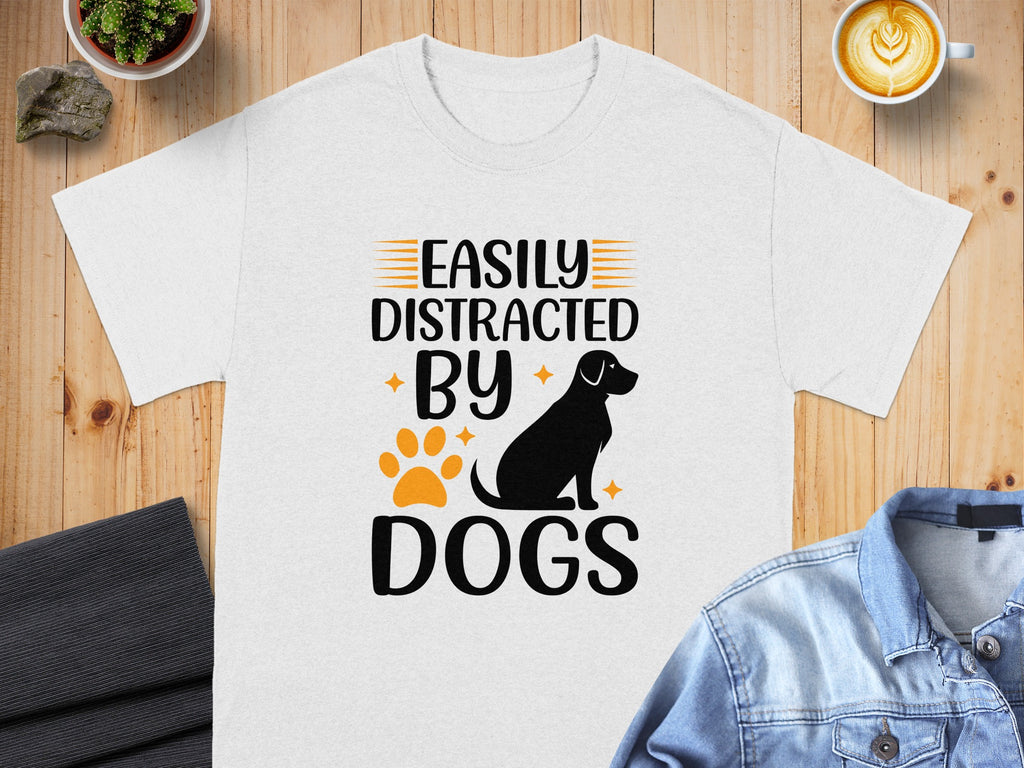 White t-shirt with text "Easily Distracted By Dogs," a dog silhouette, and paw print.