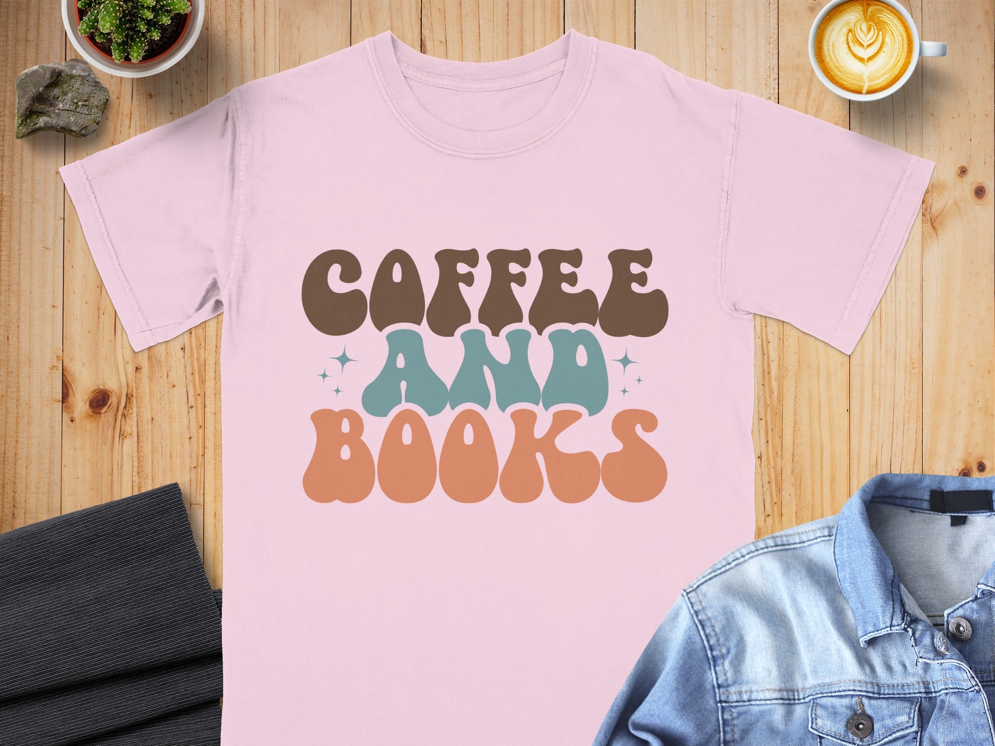 Pink t-shirt with groovy "COFFEE AND BOOKS" lettering.