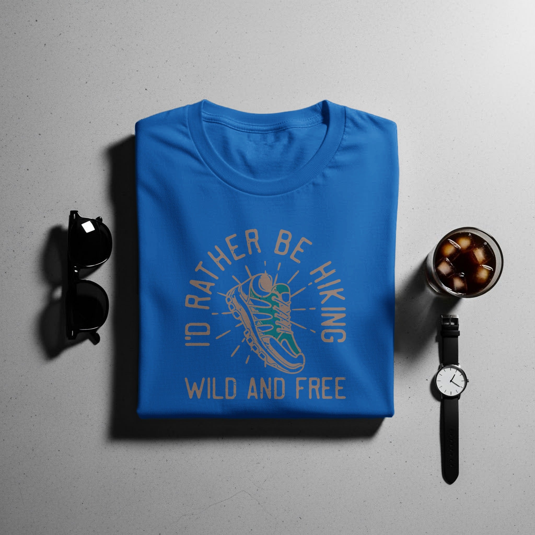 Blue t-shirt with "I'd Rather Be Hiking" and hiking boot graphic.
