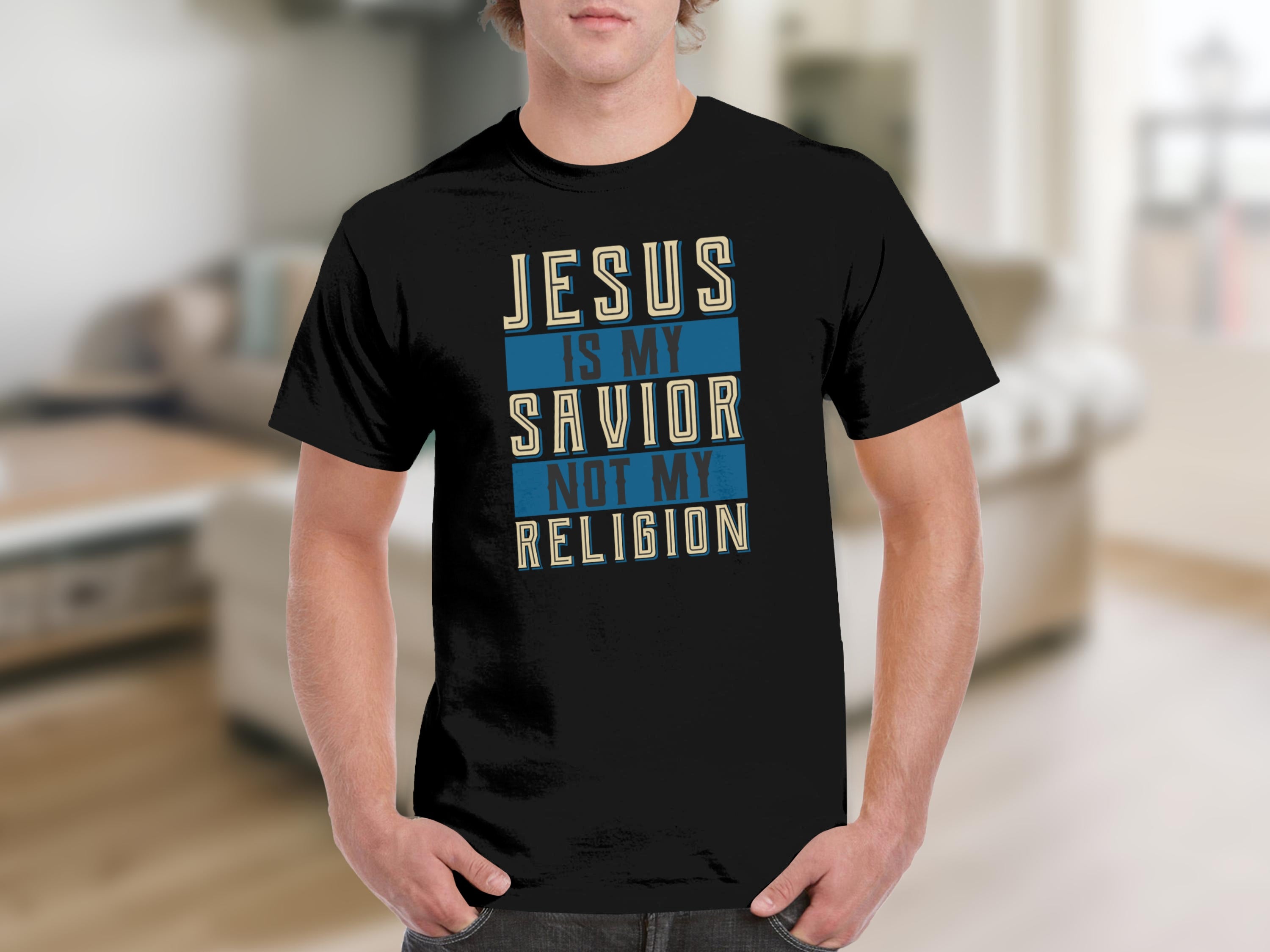 Black t-shirt with text "JESUS IS MY SAVIOR NOT MY RELIGION".