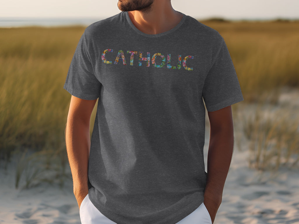 Dark grey t-shirt with colorful floral pattern spelling "CATHOLIC" across the chest.