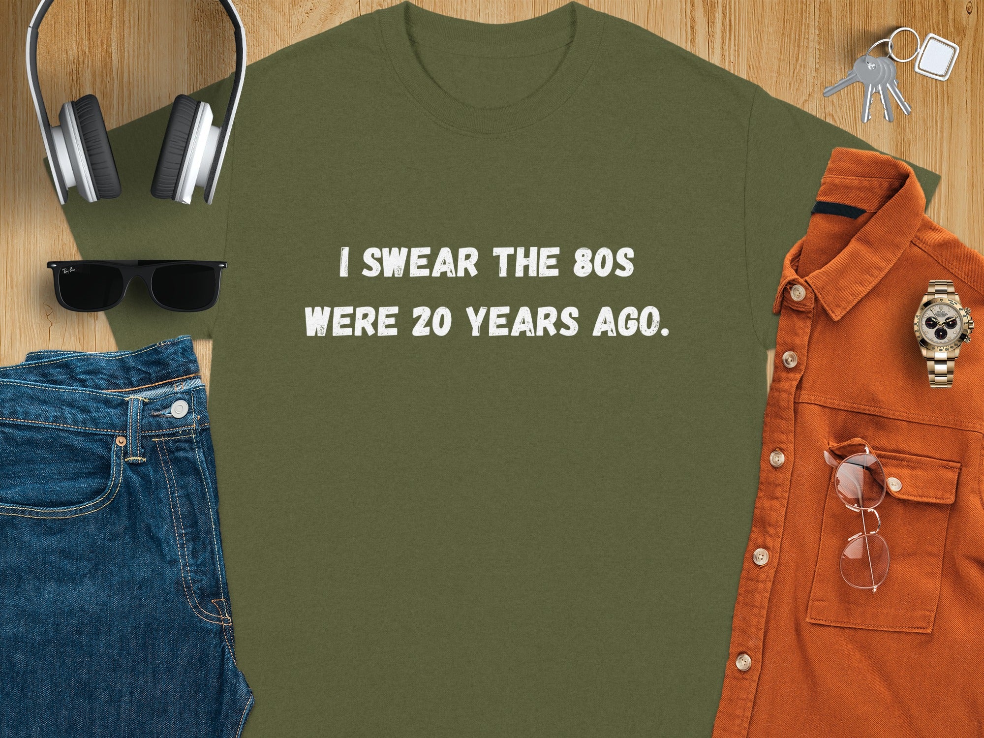 Green t-shirt with white text "I SWEAR THE 80S WERE 20 YEARS AGO."