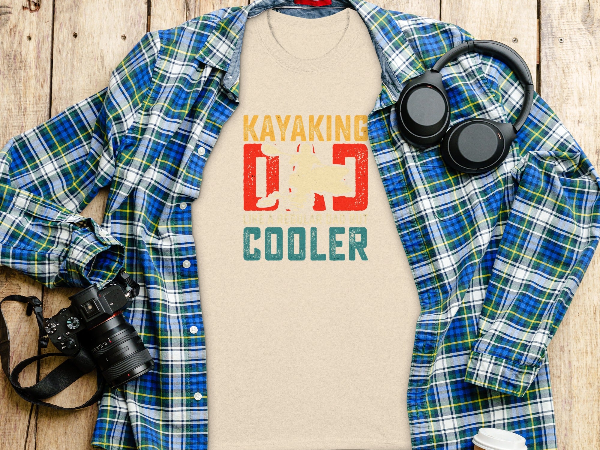Kayaking Dad: Like A Regular Dad But Cooler shirt graphic on beige t-shirt.