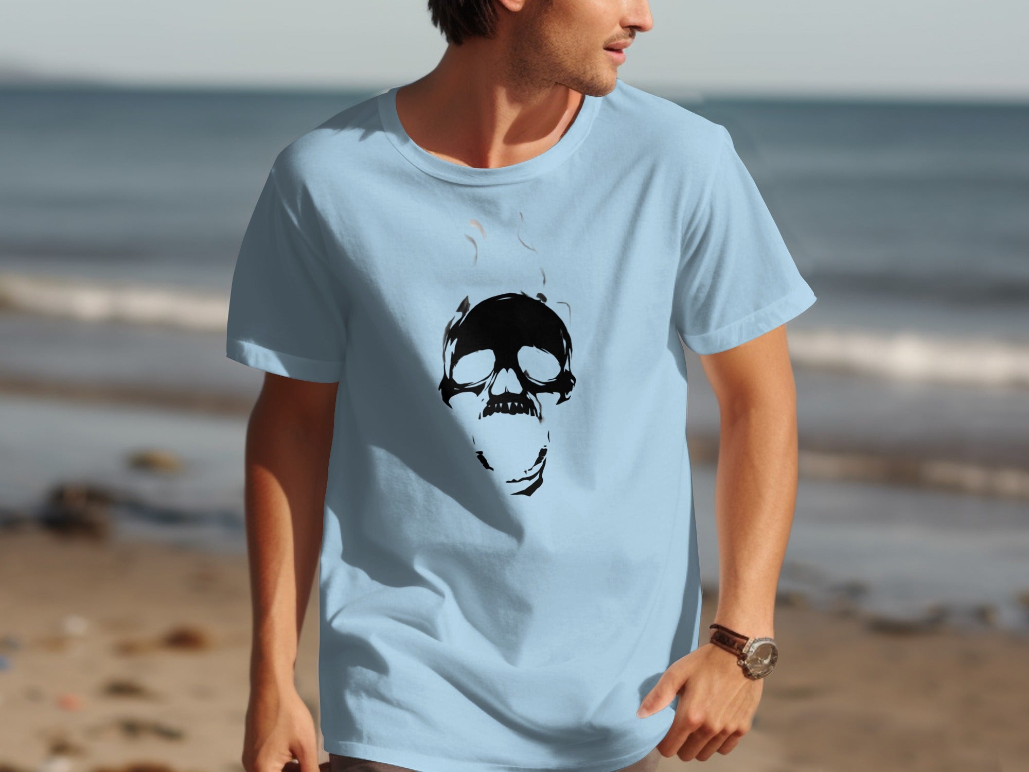 Light blue t-shirt with a black graphic of a smoking skull on the front.