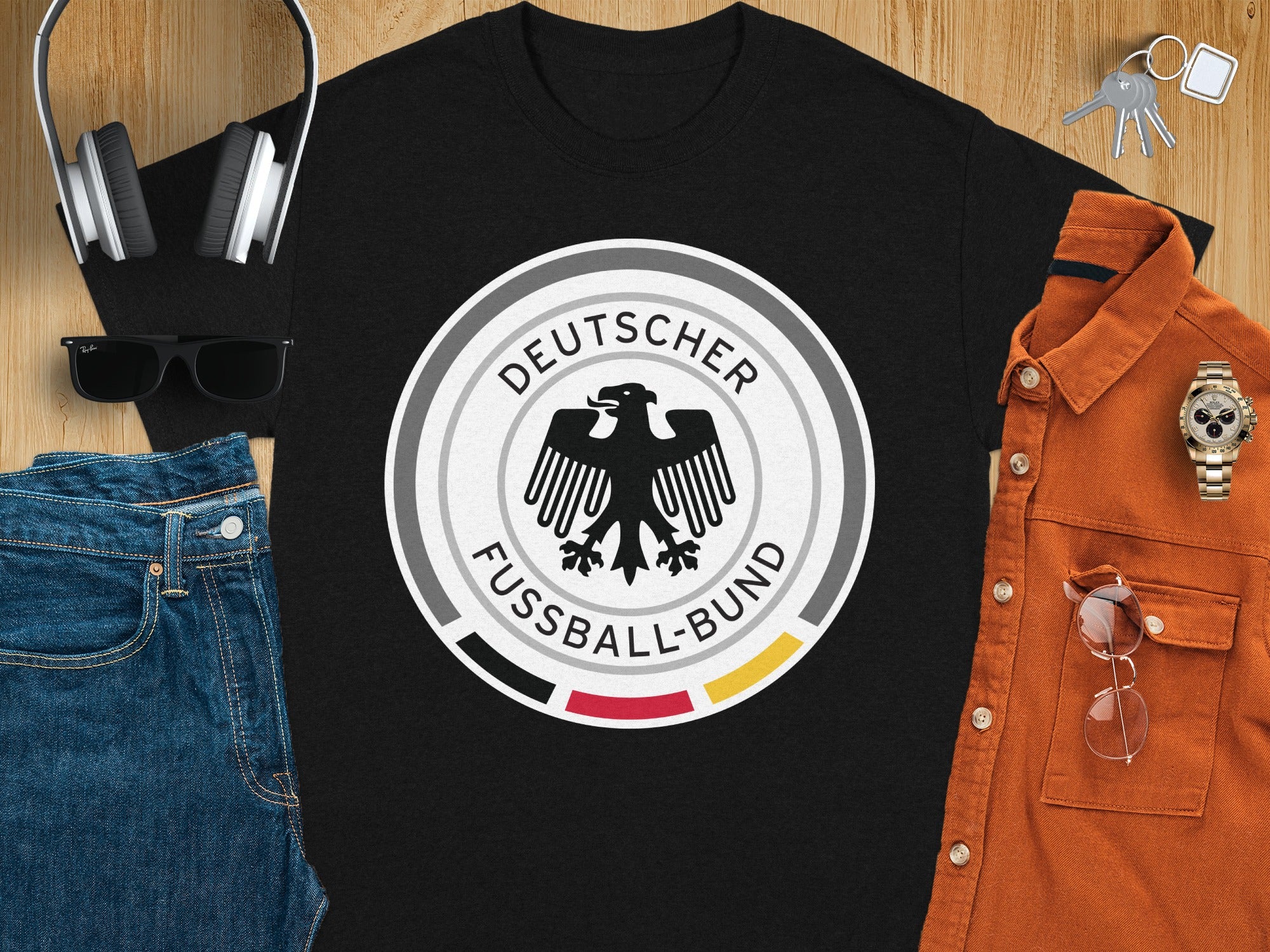 Black t-shirt with Deutscher Fußball-Bund logo featuring a black eagle and German flag colors.