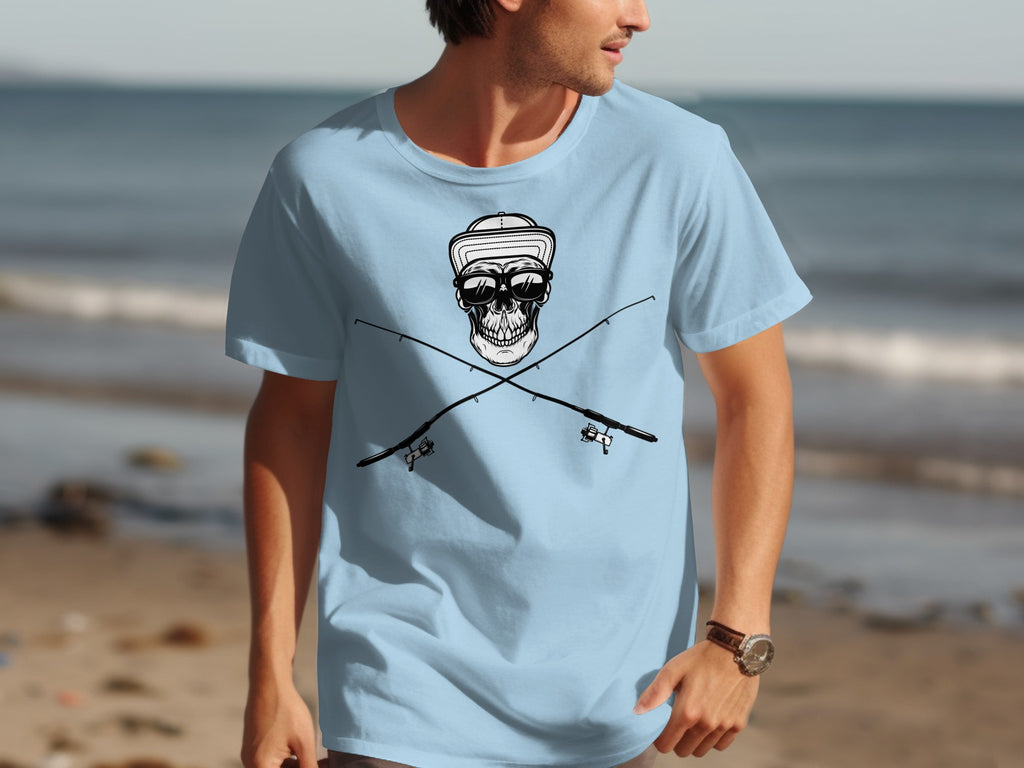 Light blue t-shirt with a graphic of a skull wearing sunglasses and a hat, crossed over fishing rods.
