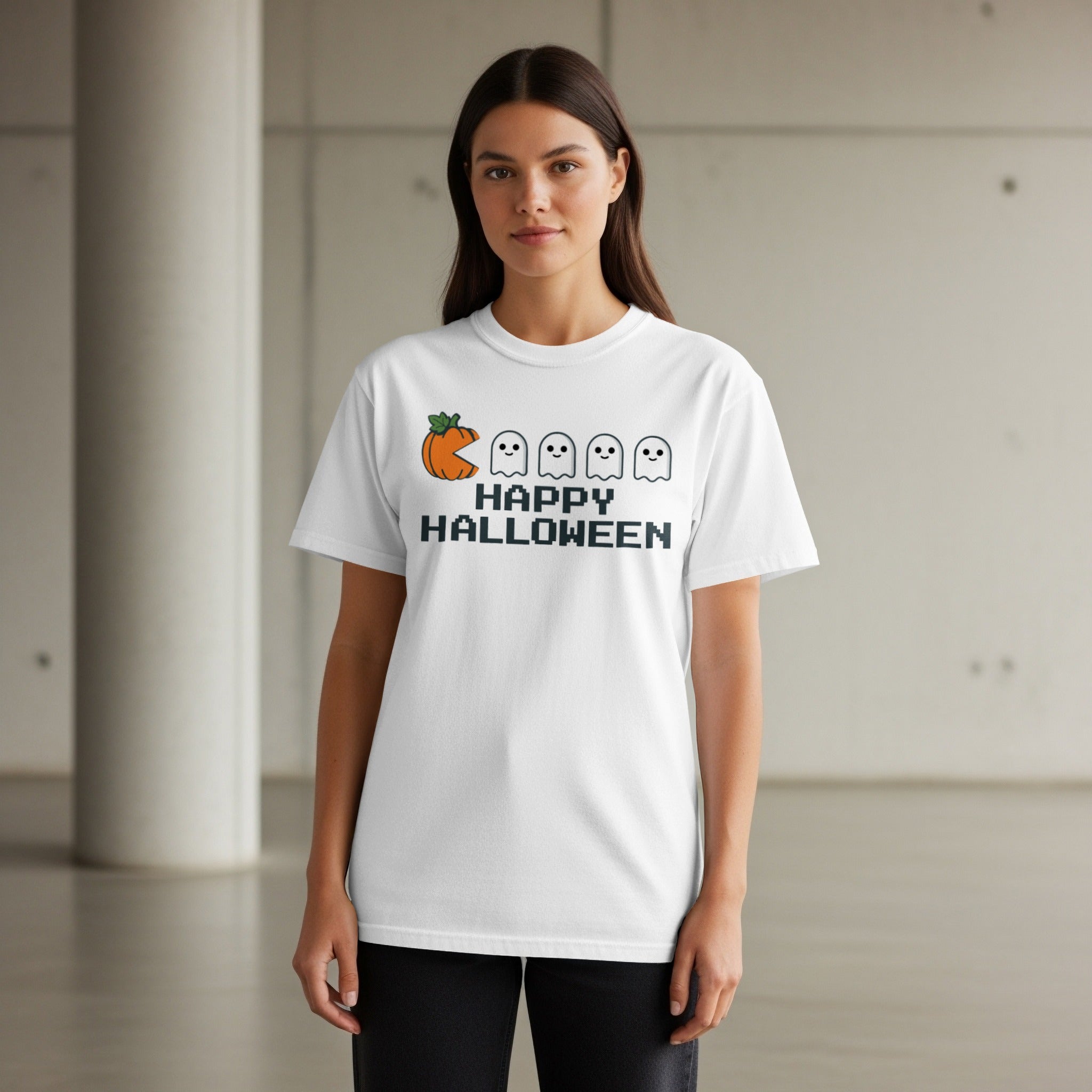 White t-shirt with a graphic of a pumpkin, four ghosts, and "HAPPY HALLOWEEN".