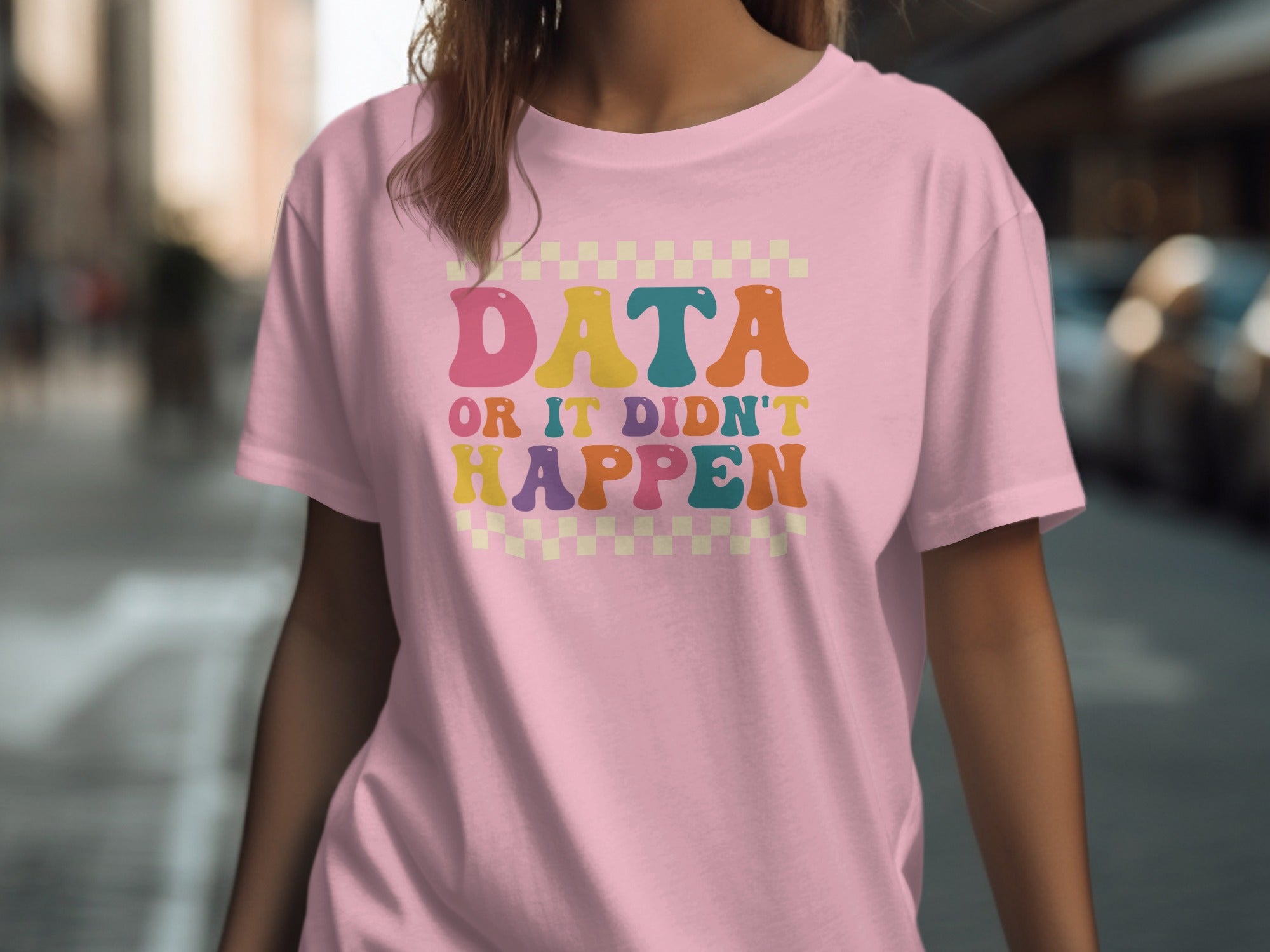 Pink t-shirt with "DATA OR IT DIDN'T HAPPEN" text in colorful retro font.