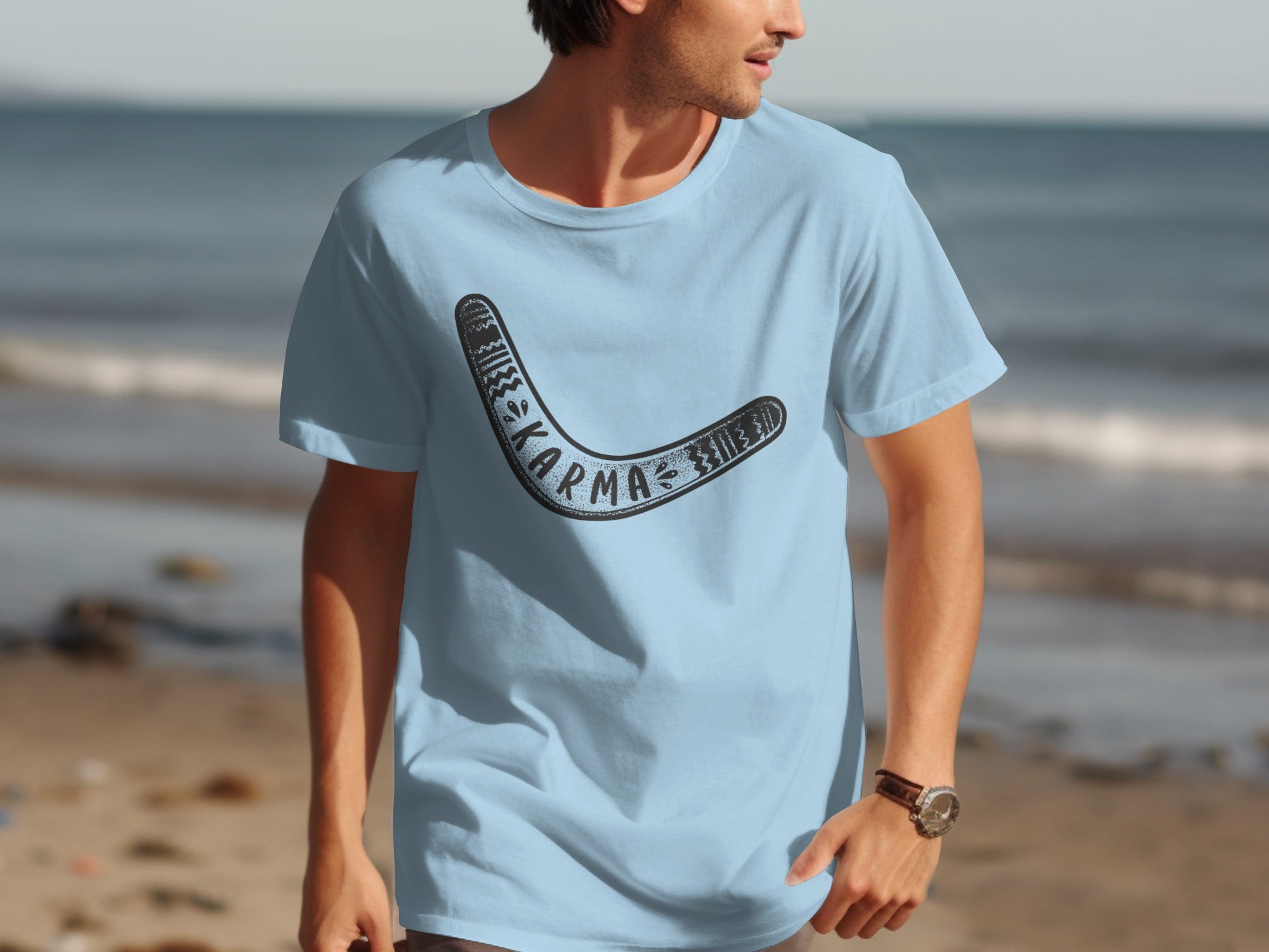 Light blue t-shirt with a black boomerang graphic and the word "Karma".