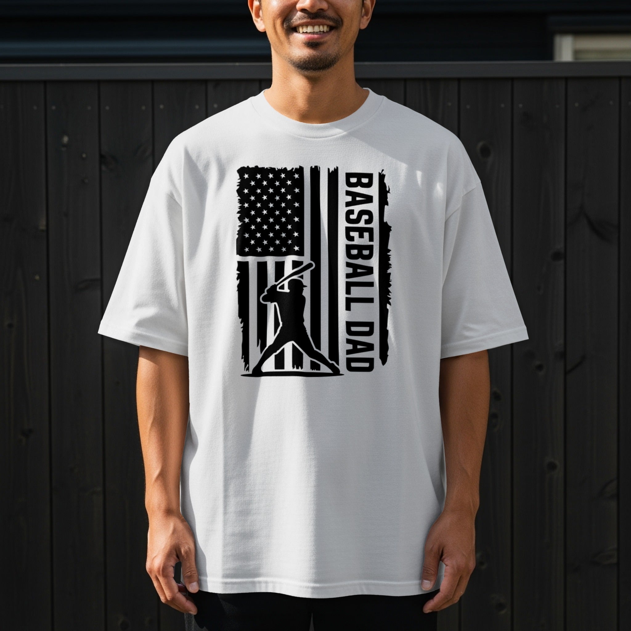 White t-shirt with distressed American flag and baseball batter graphic and "BASEBALL DAD" text.