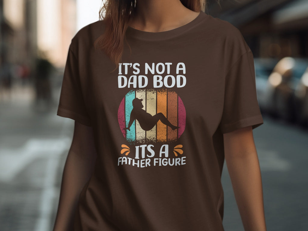 Brown t-shirt with graphic: "It's not a dad bod, it's a father figure."