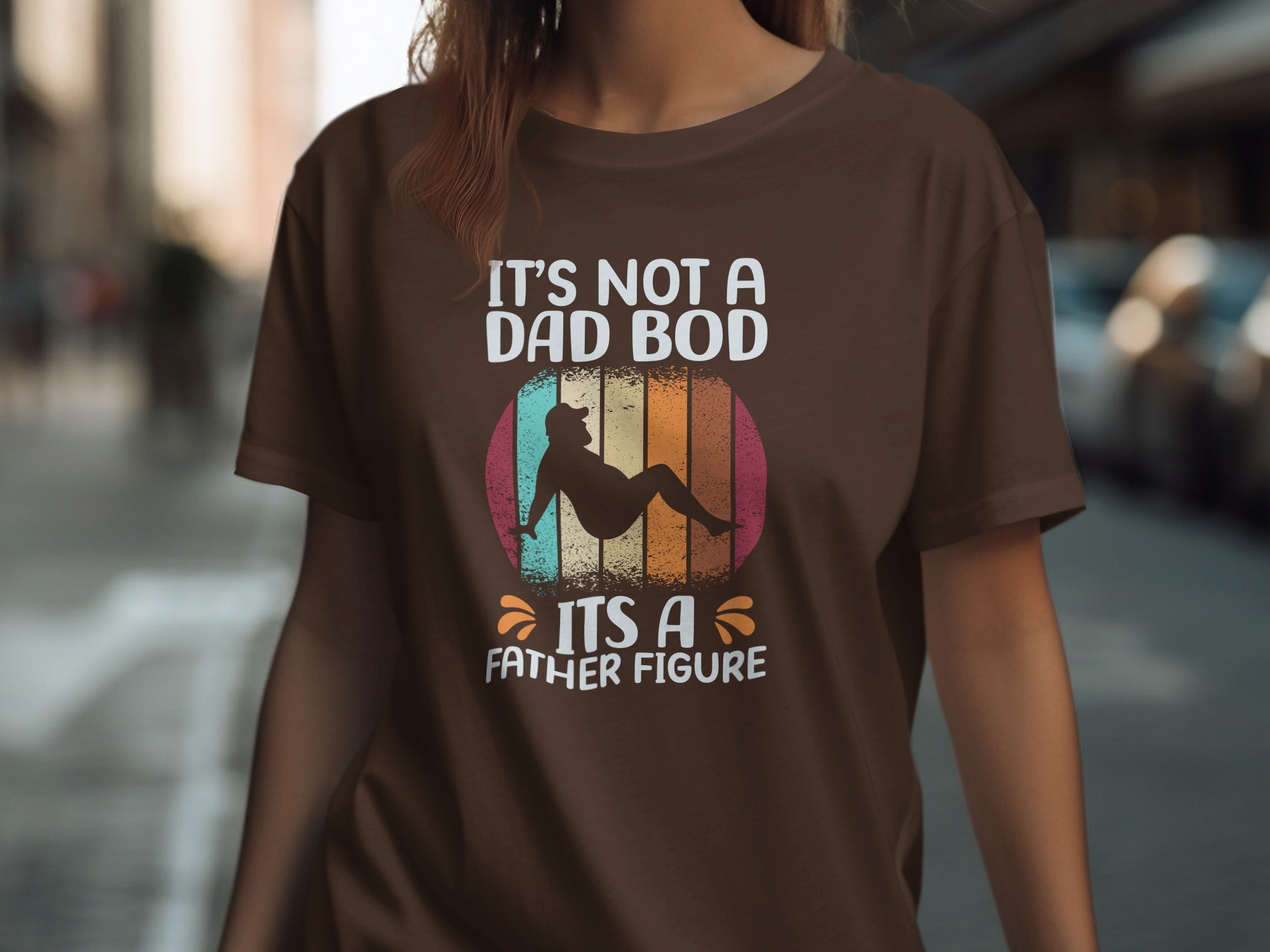 Brown t-shirt with graphic: "It's not a dad bod, it's a father figure."