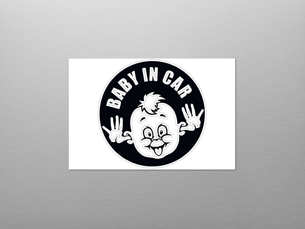 Black and white "Baby in Car" sticker with a cartoon baby face and peace signs.