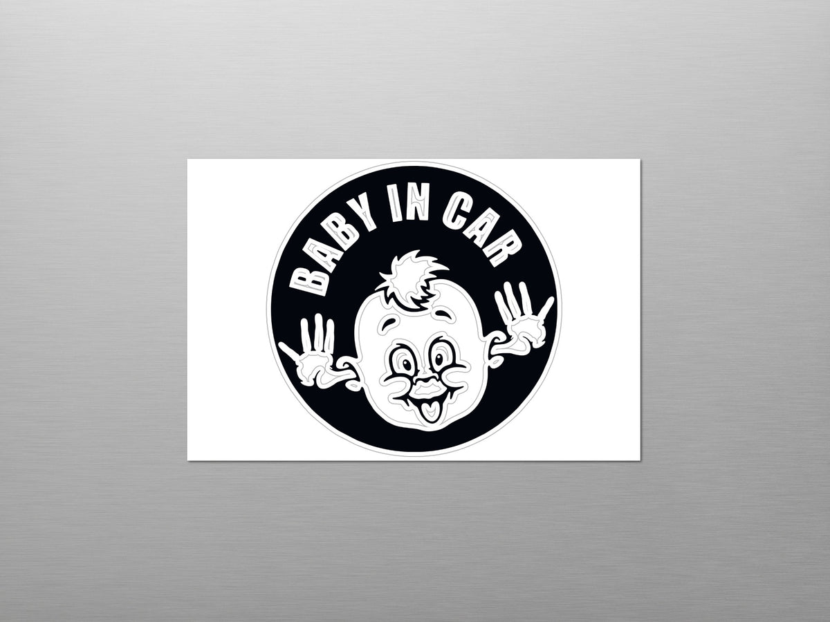 Black and white "Baby in Car" sticker with a cartoon baby face and peace signs.