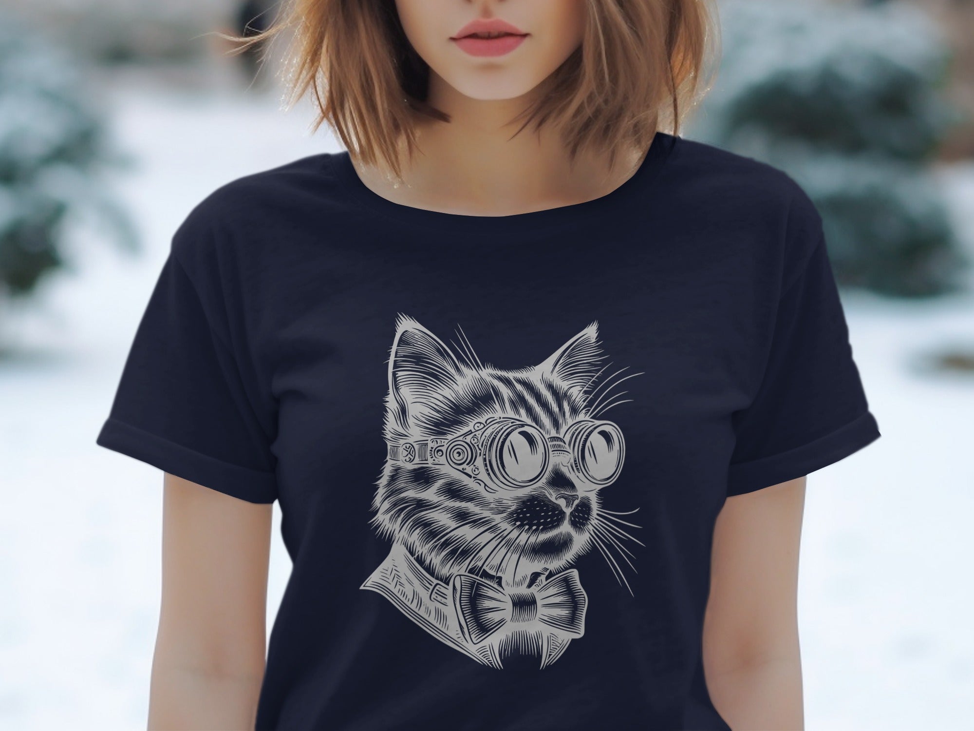 Dark navy t-shirt with a line art print of a cat wearing goggles and a bowtie.