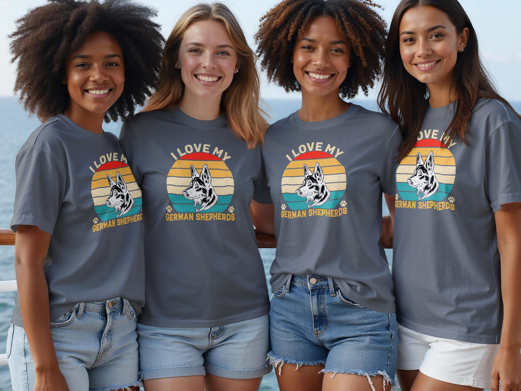 Four women in gray t-shirts featuring a German Shepherd graphic and text.