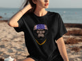 Black t-shirt with Bigfoot graphic wearing American flag bandana and gold chain.