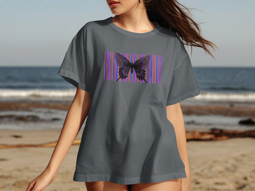 Gray t-shirt with black butterfly on colorful striped background