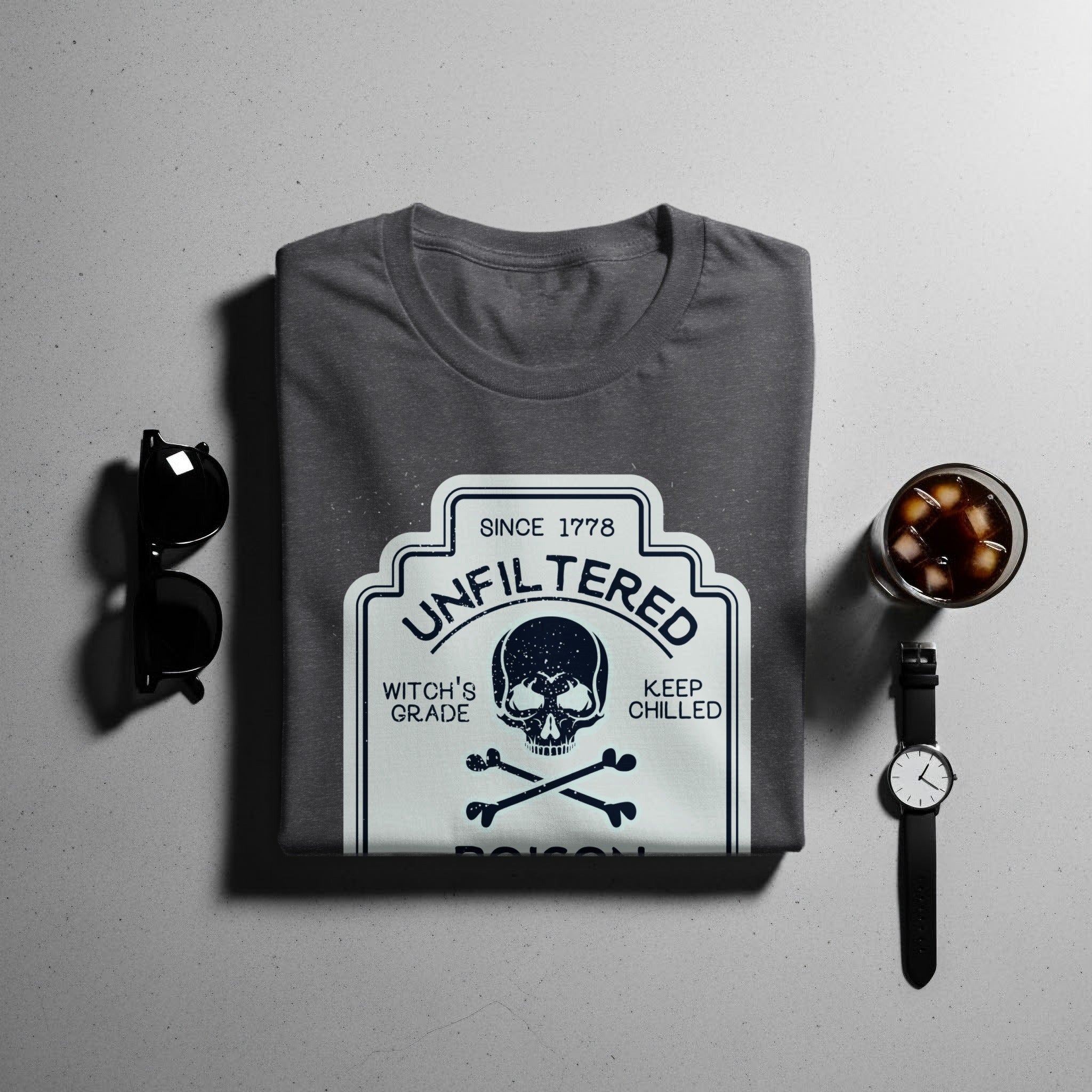 Dark gray t-shirt with "Unfiltered Witch's Grade Keep Chilled" skull graphic.