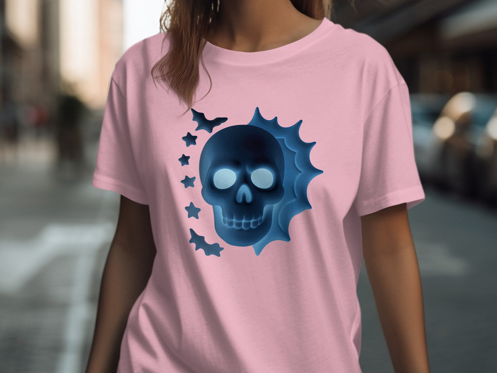 Pink t-shirt with a blue glowing skull and bats on the front.