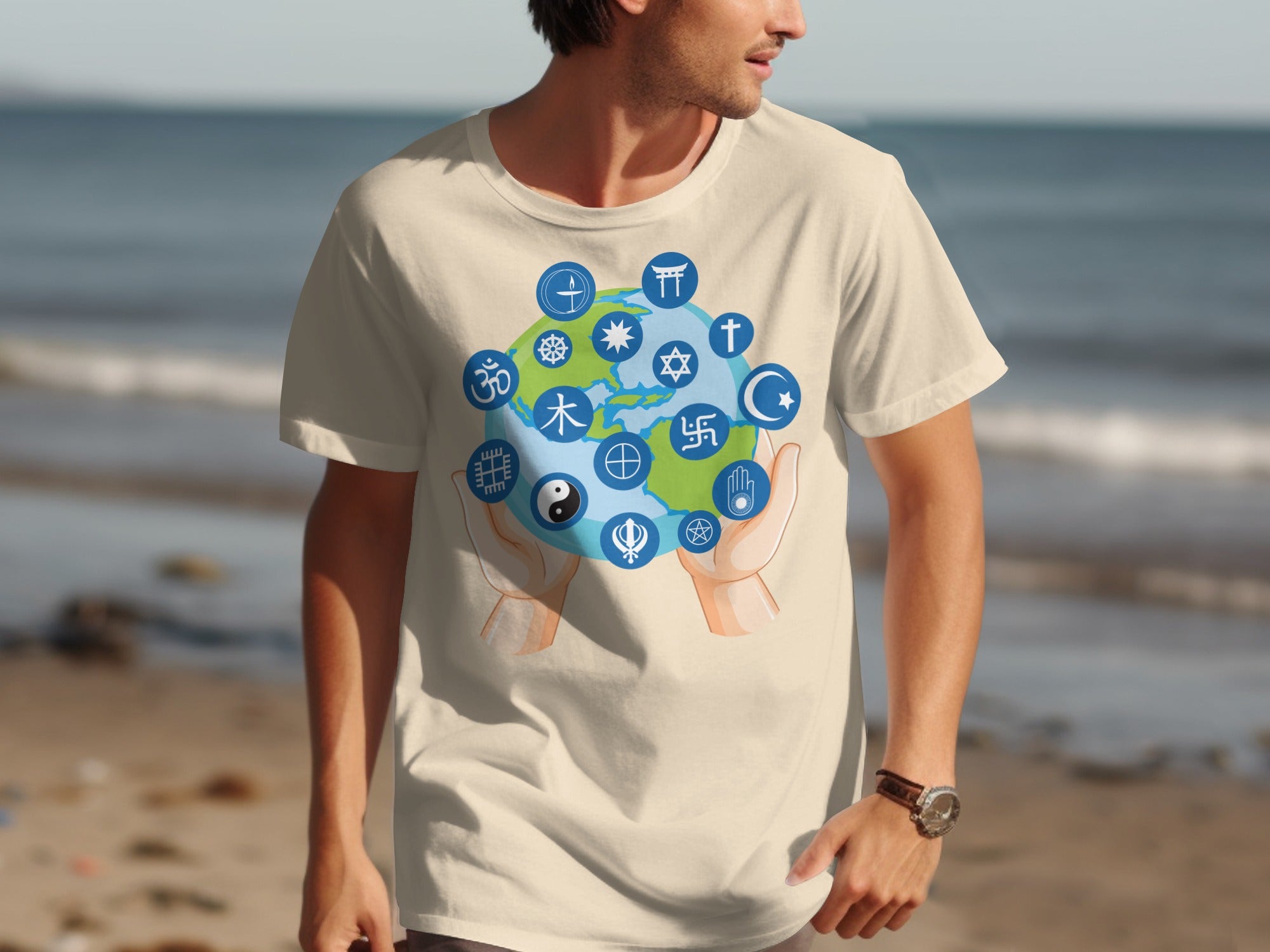 Cream t-shirt with earth and various religious symbols held by hands.