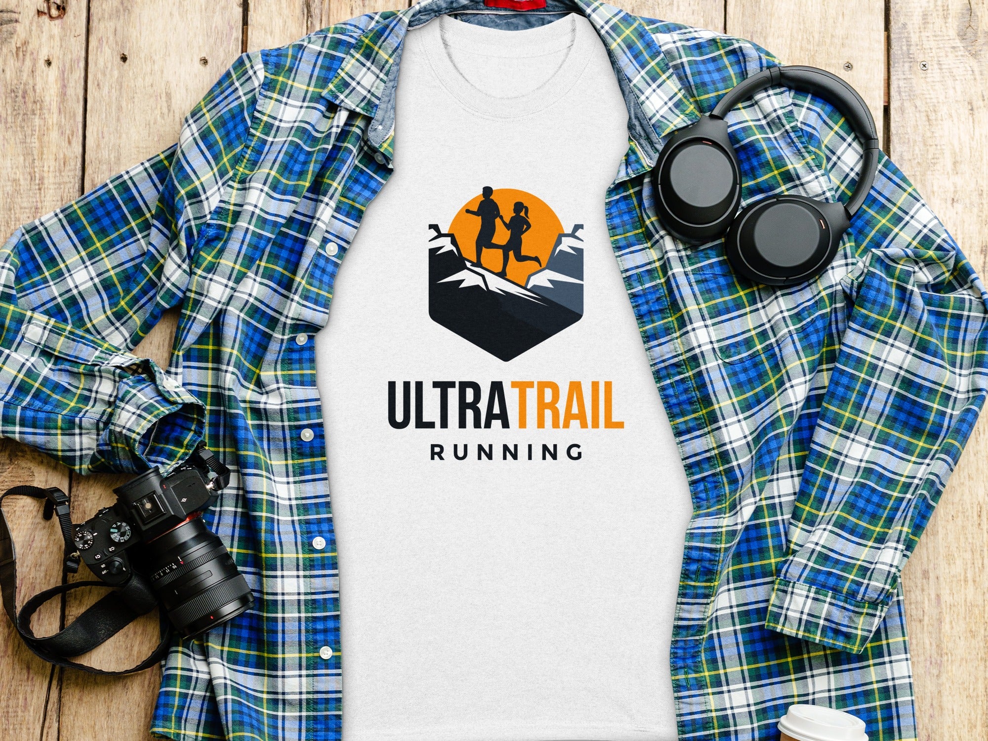 White t-shirt with "ULTRA TRAIL RUNNING" text and running graphic.