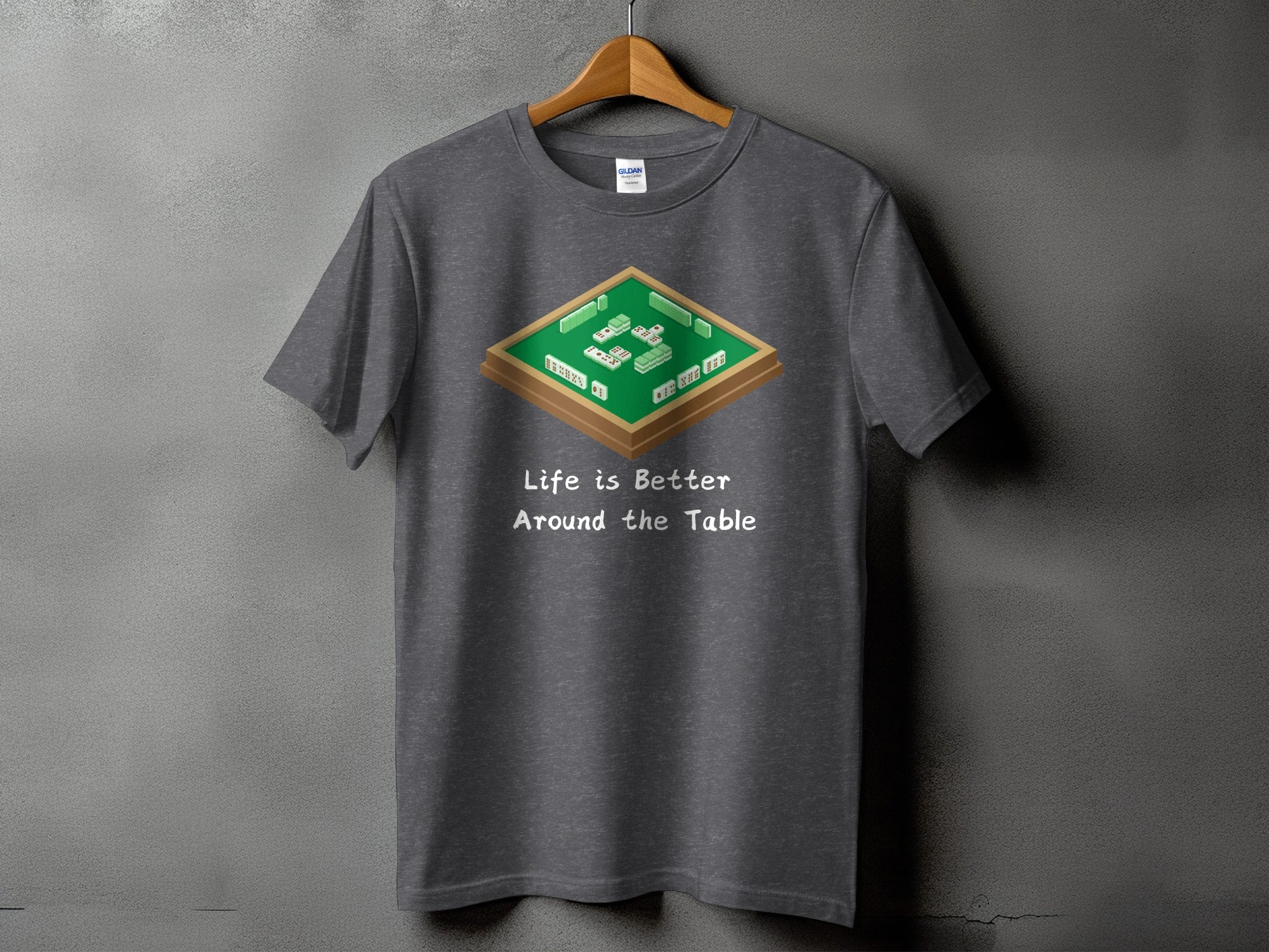 Dark gray t-shirt with a mahjong game and text "Life is Better Around the Table".