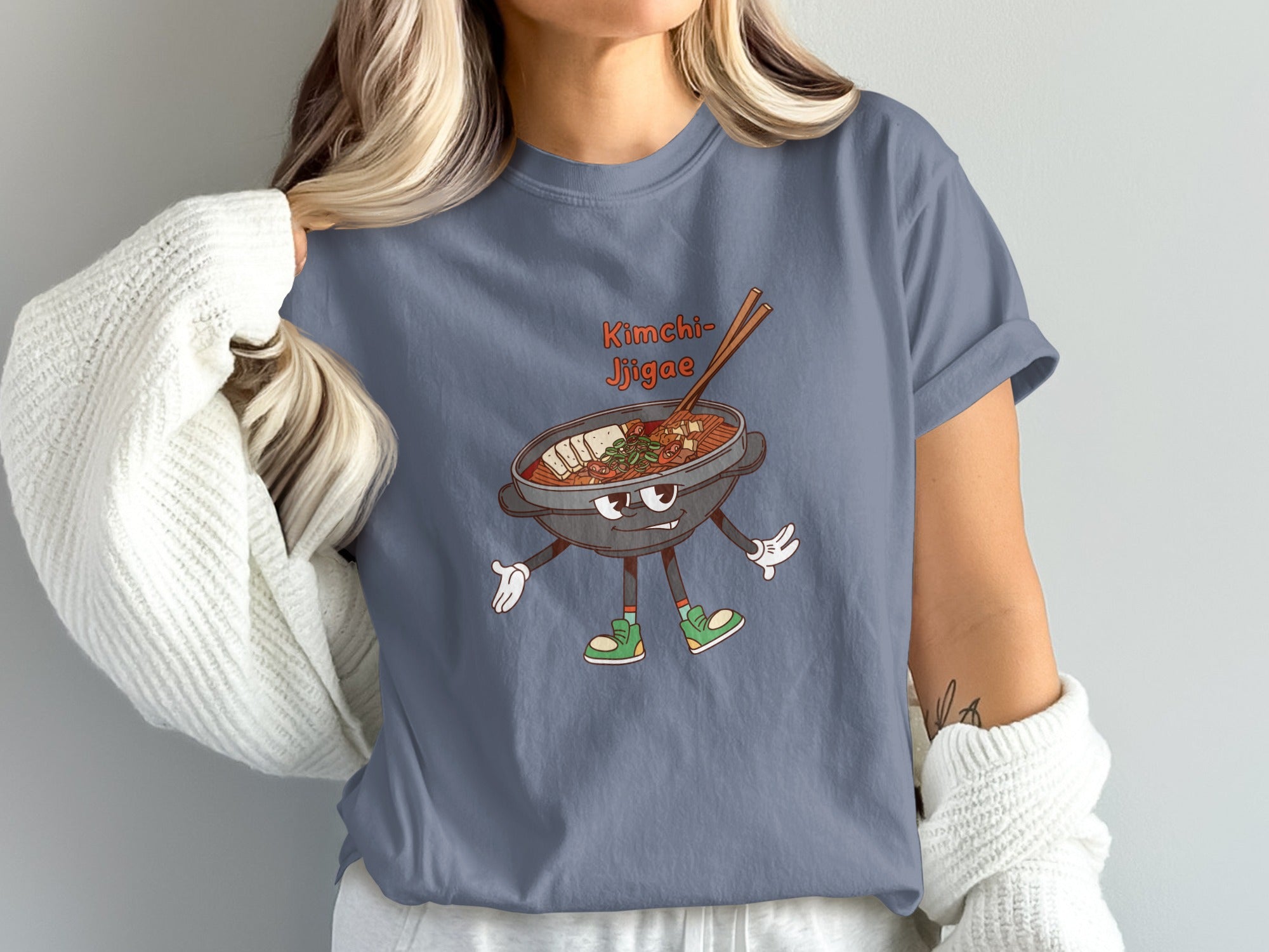 Kimchi Jjigae text with a cartoon bowl of soup on a grey t-shirt.