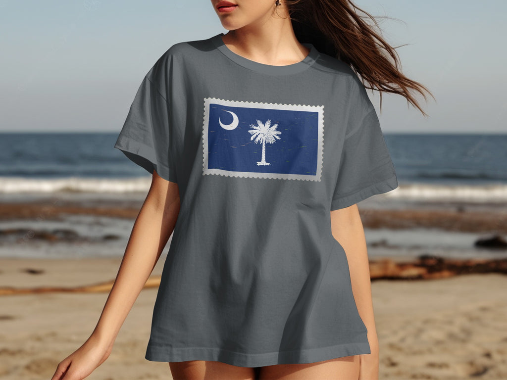 Gray t-shirt featuring a postage stamp design of the South Carolina flag.