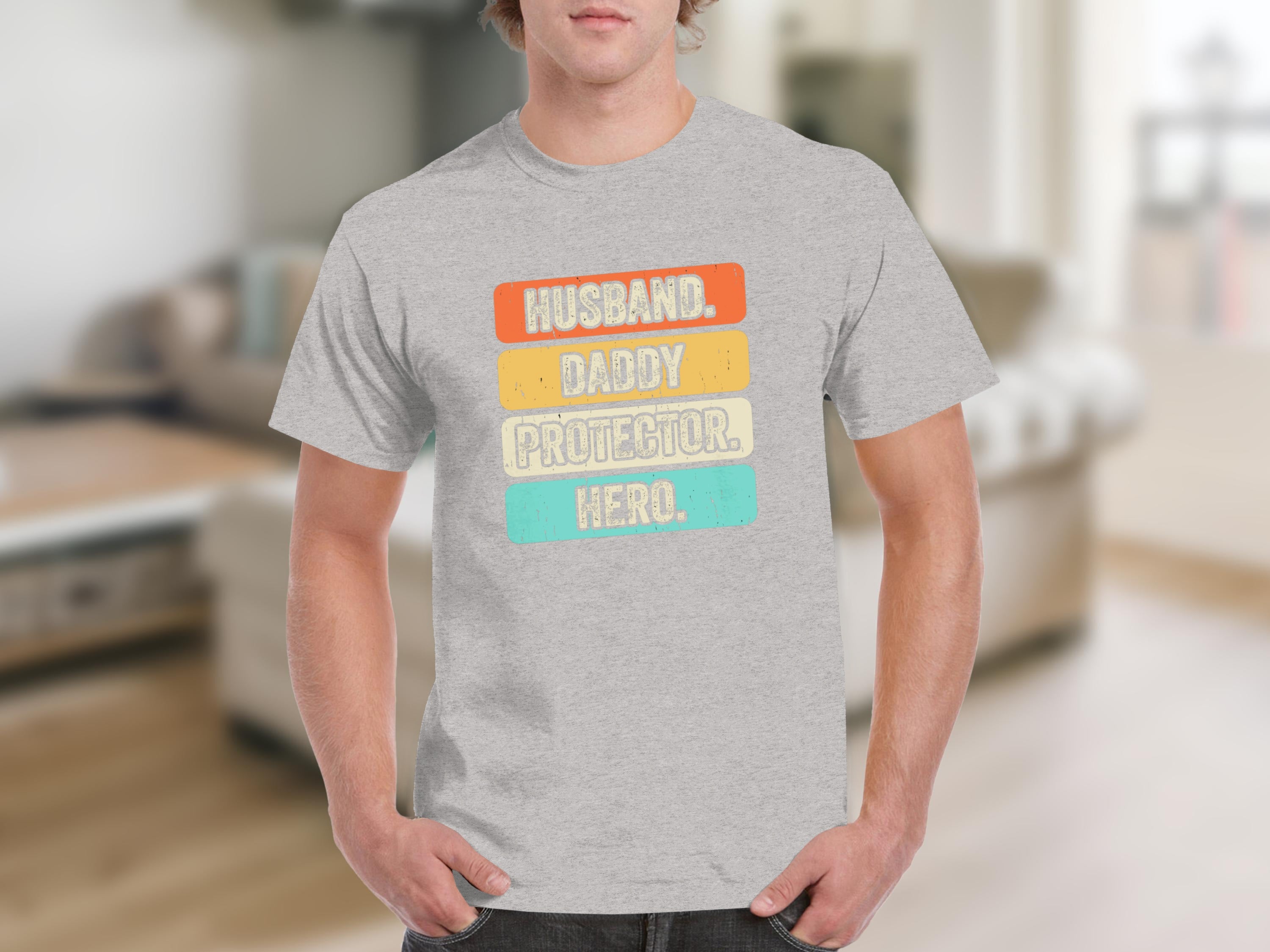 Grey t-shirt with "Husband, Daddy, Protector, Hero" text in retro style.
