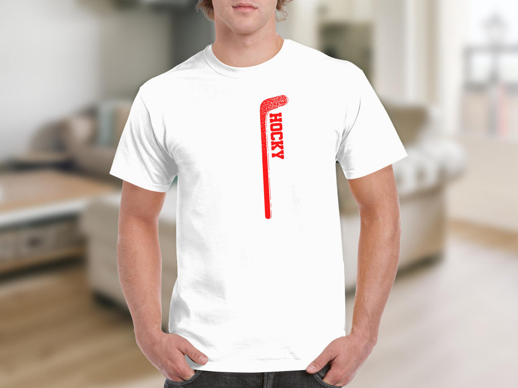 White t-shirt with a red distressed hockey stick graphic and text.