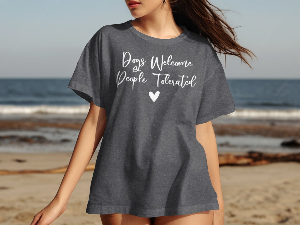 Dark grey t-shirt with "Dogs Welcome People Tolerated" and a heart.