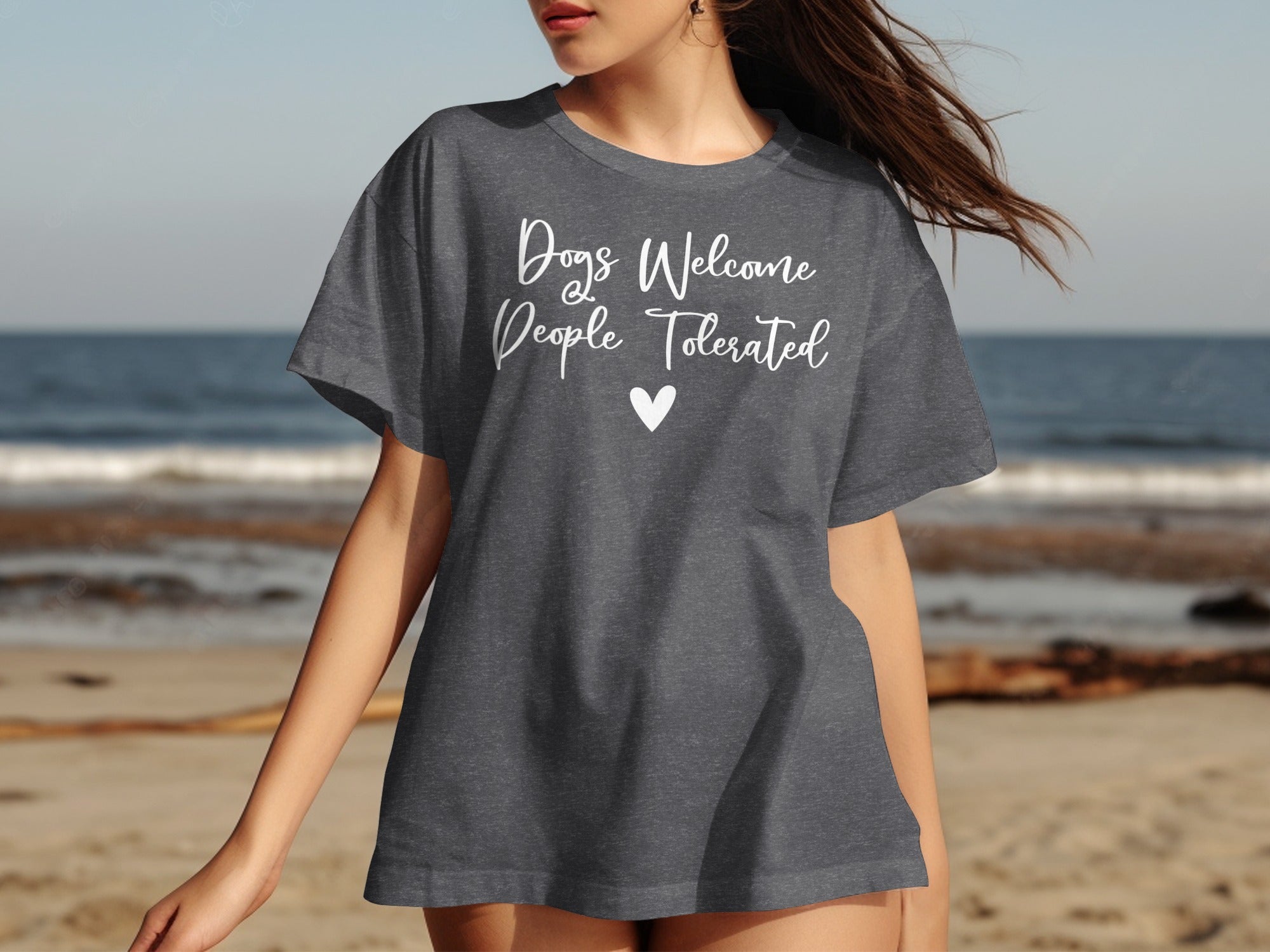 Dark grey t-shirt with "Dogs Welcome People Tolerated" and a heart.
