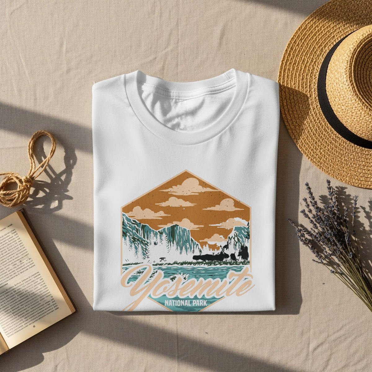 White t-shirt featuring a hexagonal graphic of Yosemite National Park with animals.