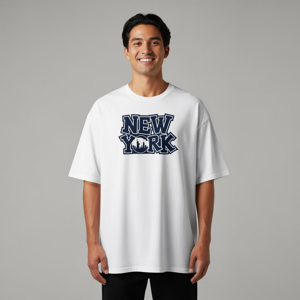 White t-shirt with navy blue New York skyline graphic on front.