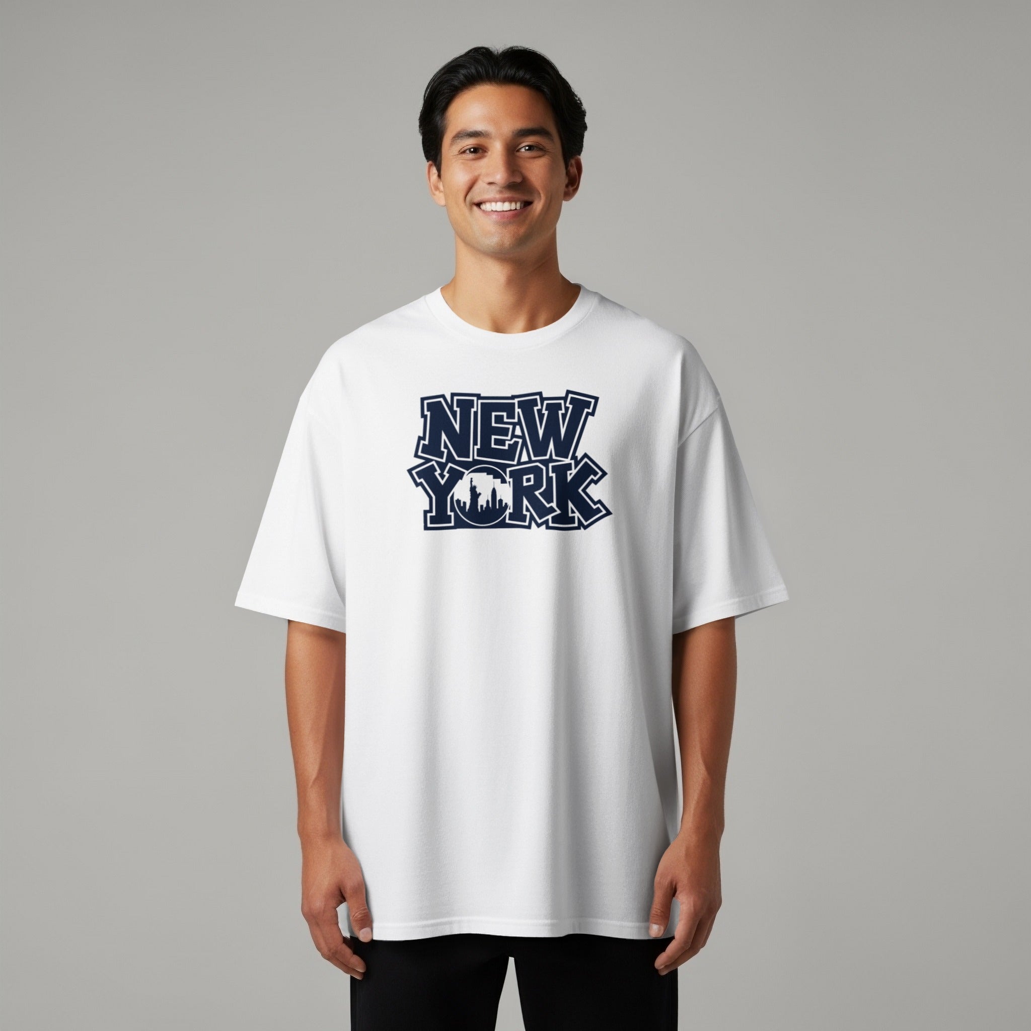 White t-shirt with navy blue New York skyline graphic on front.