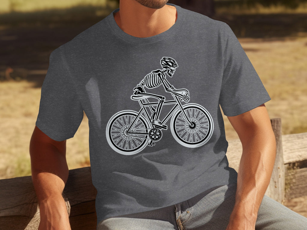 Skeleton cyclist in helmet riding a bicycle, graphic on dark grey t-shirt.