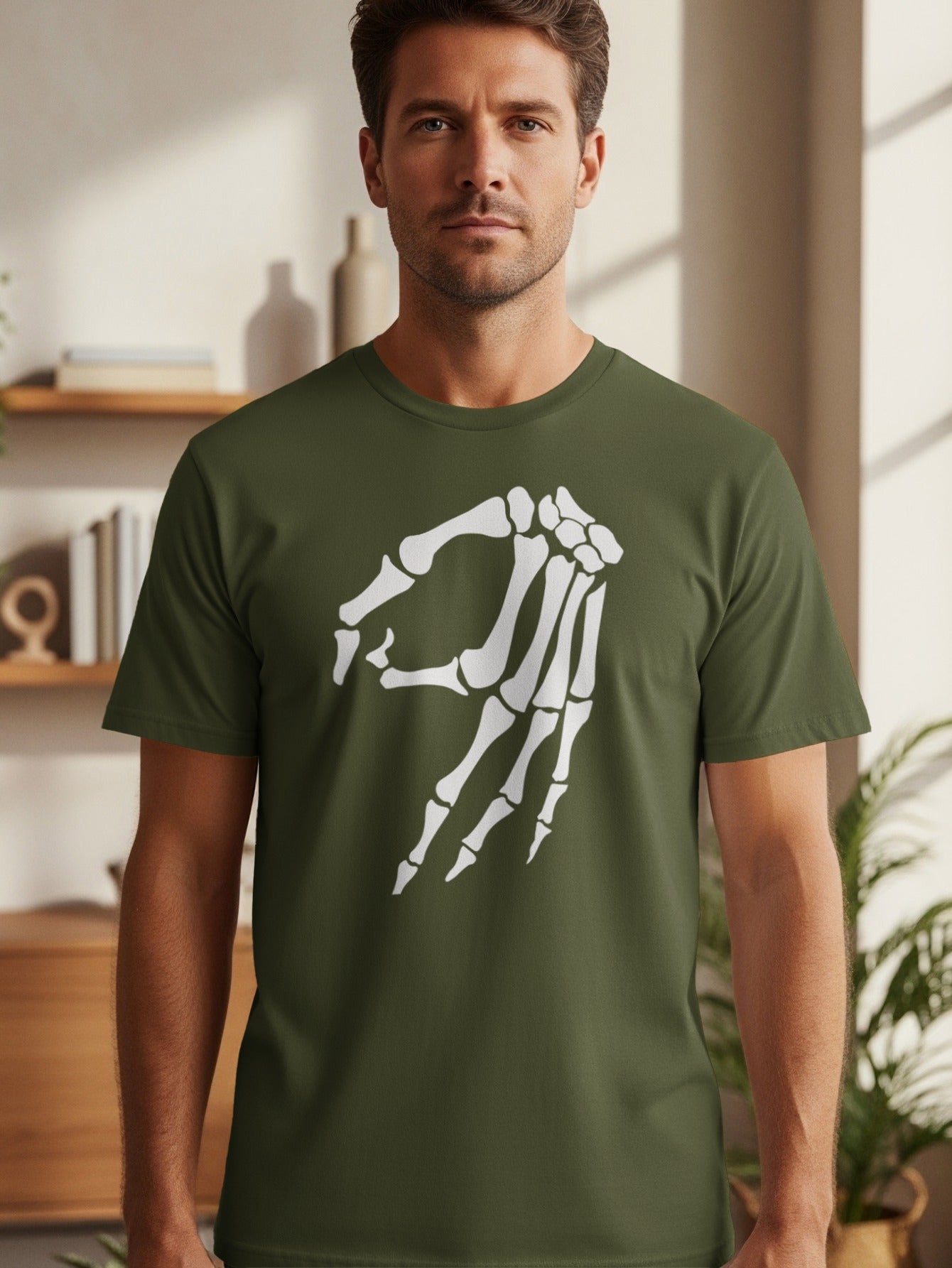 Men's olive green t-shirt with white skeleton hand graphic.