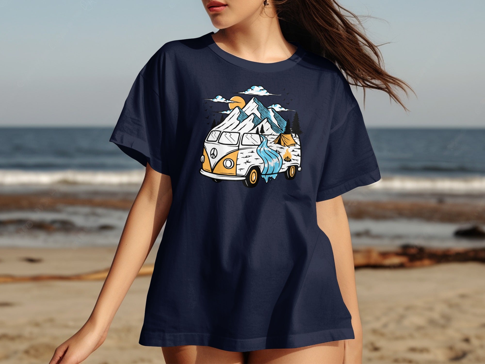 Navy t-shirt with a white and orange camper van graphic featuring mountains and a river.