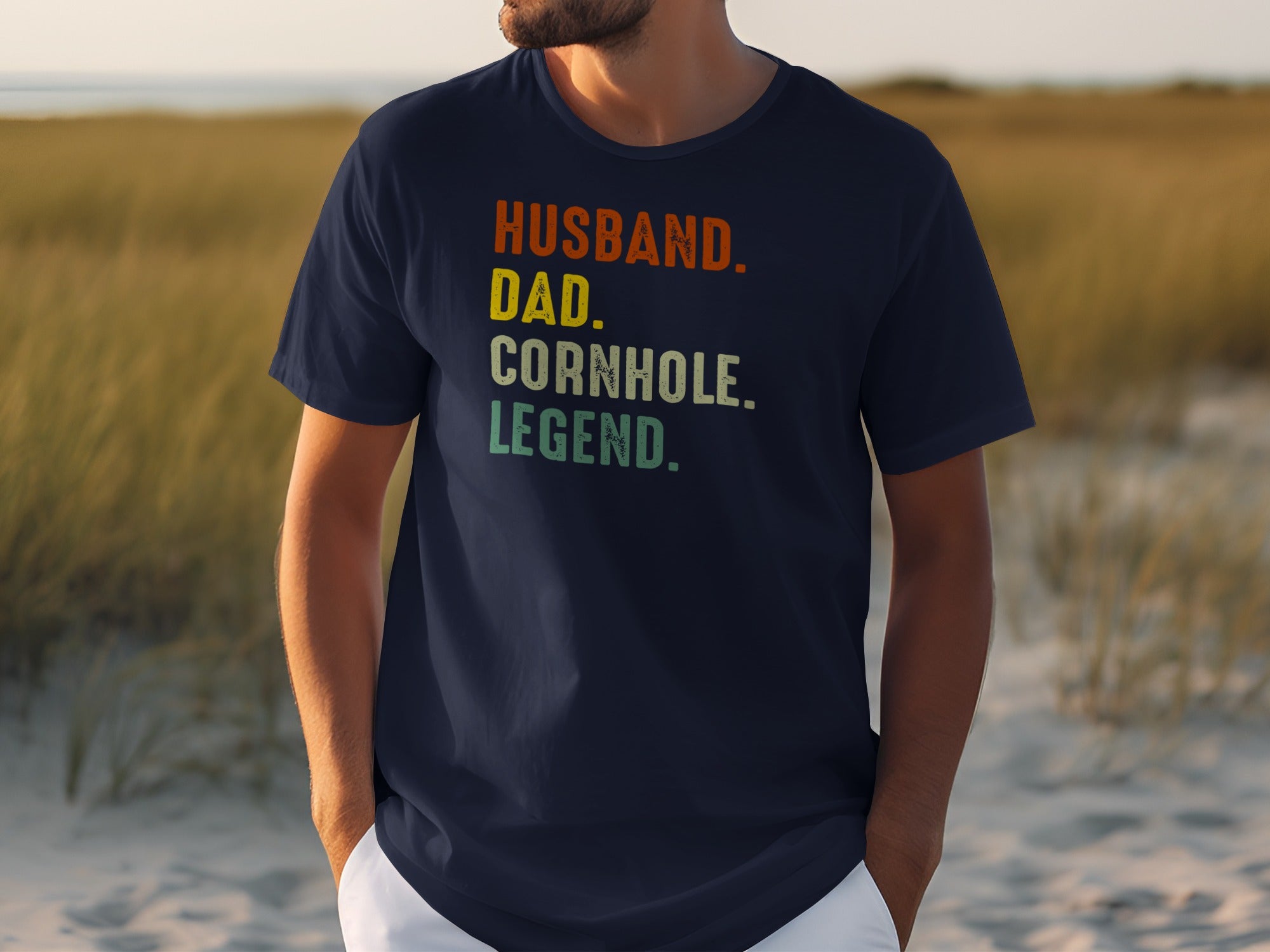 Navy t-shirt with text "Husband. Dad. Cornhole. Legend."
