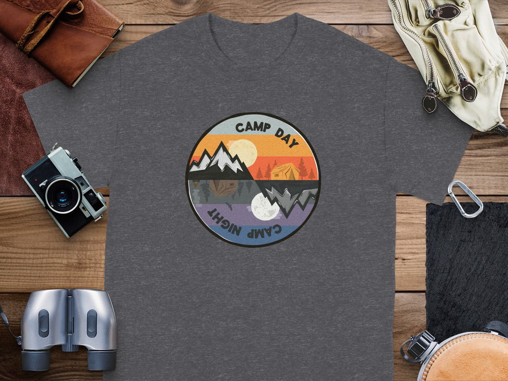 Graphic t-shirt with circular camping scene, "Camp Day" and "Camp Night" text