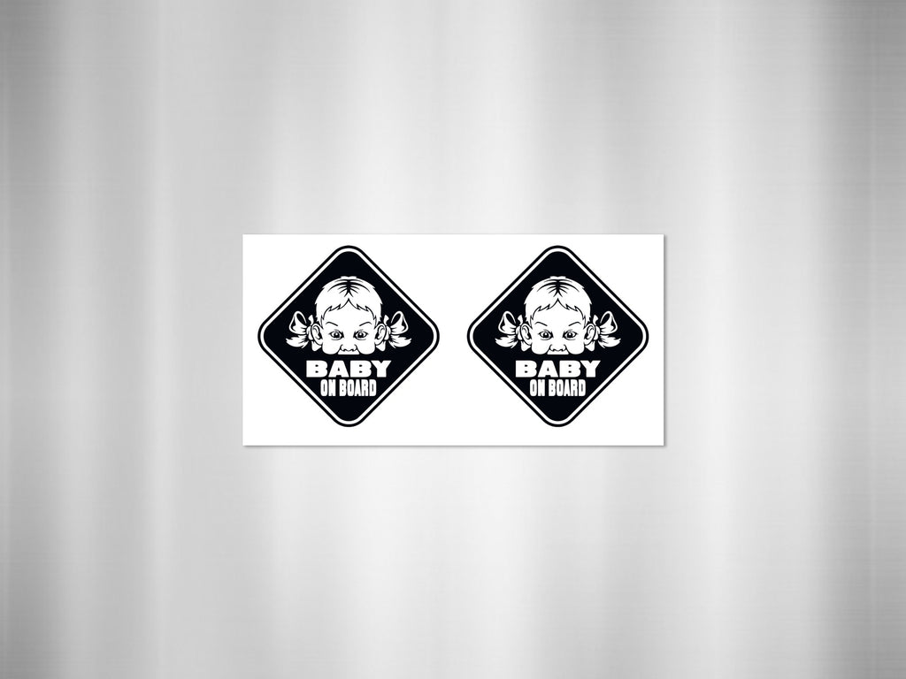 Two "Baby On Board" diamond-shaped stickers featuring a baby's face with bows.