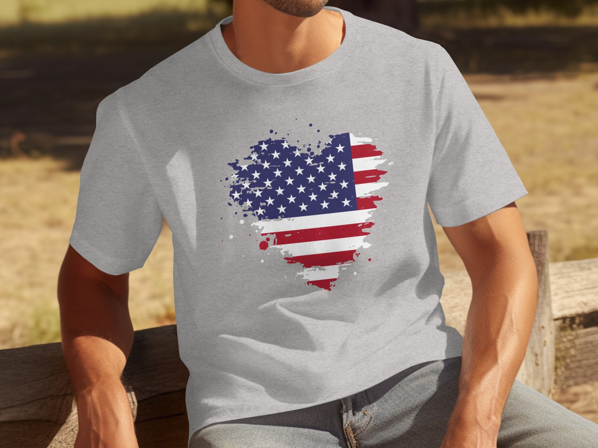 Gray t-shirt with a distressed American flag heart graphic.
