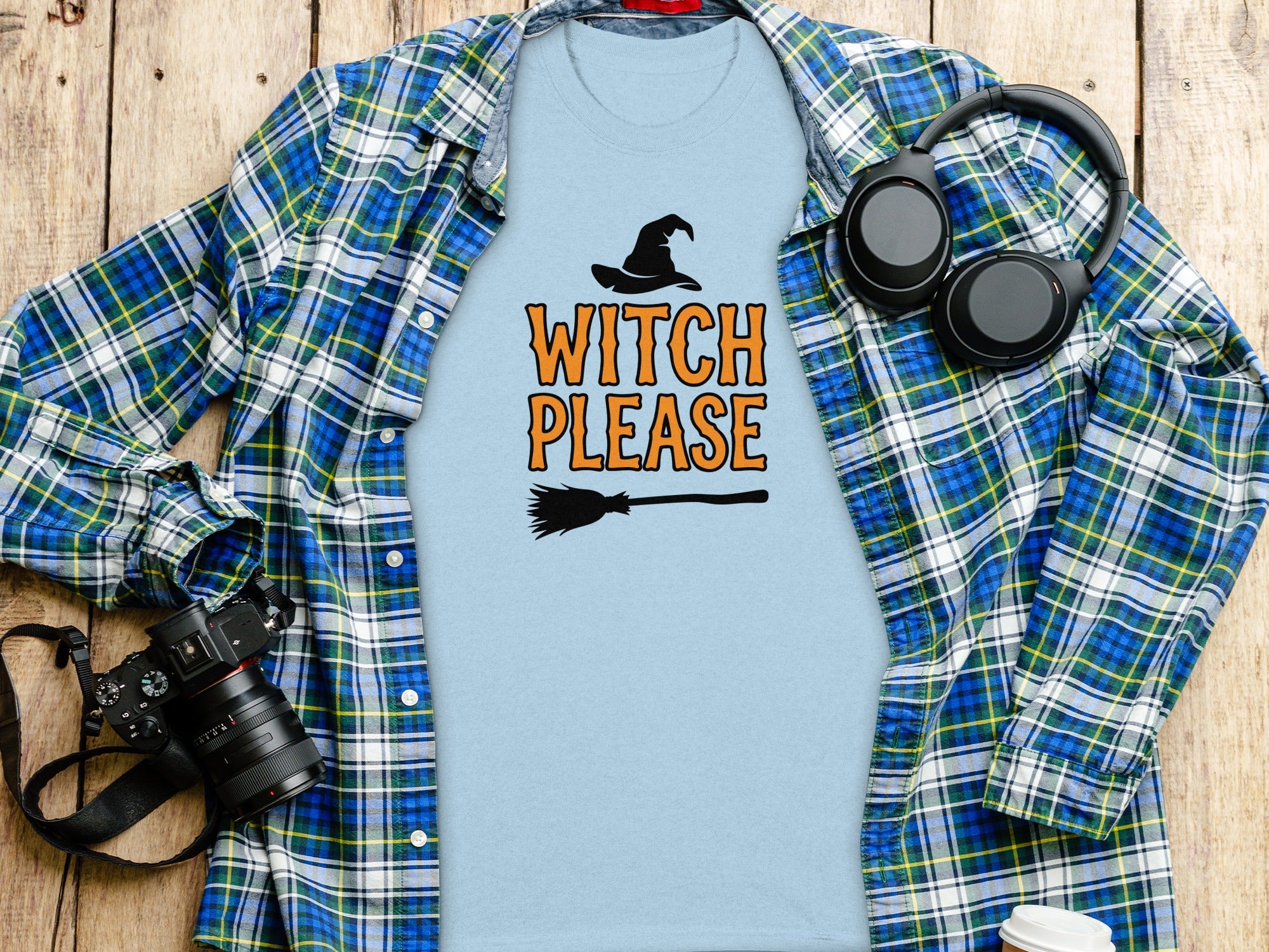 Light blue t-shirt with "Witch Please" and a witch hat and broom graphic.