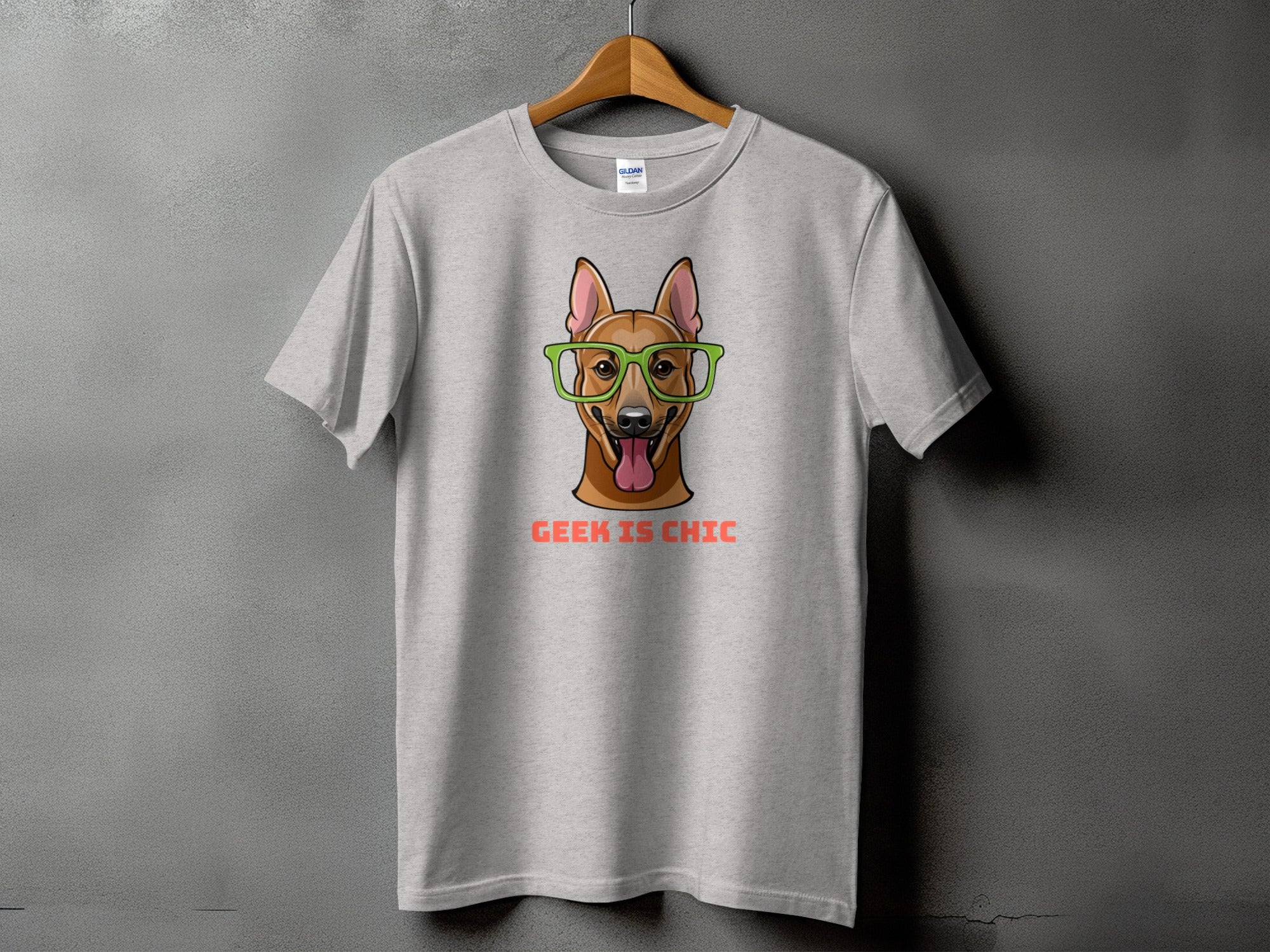 Light gray t-shirt with a cartoon dog wearing glasses and text "GEEK IS CHIC".