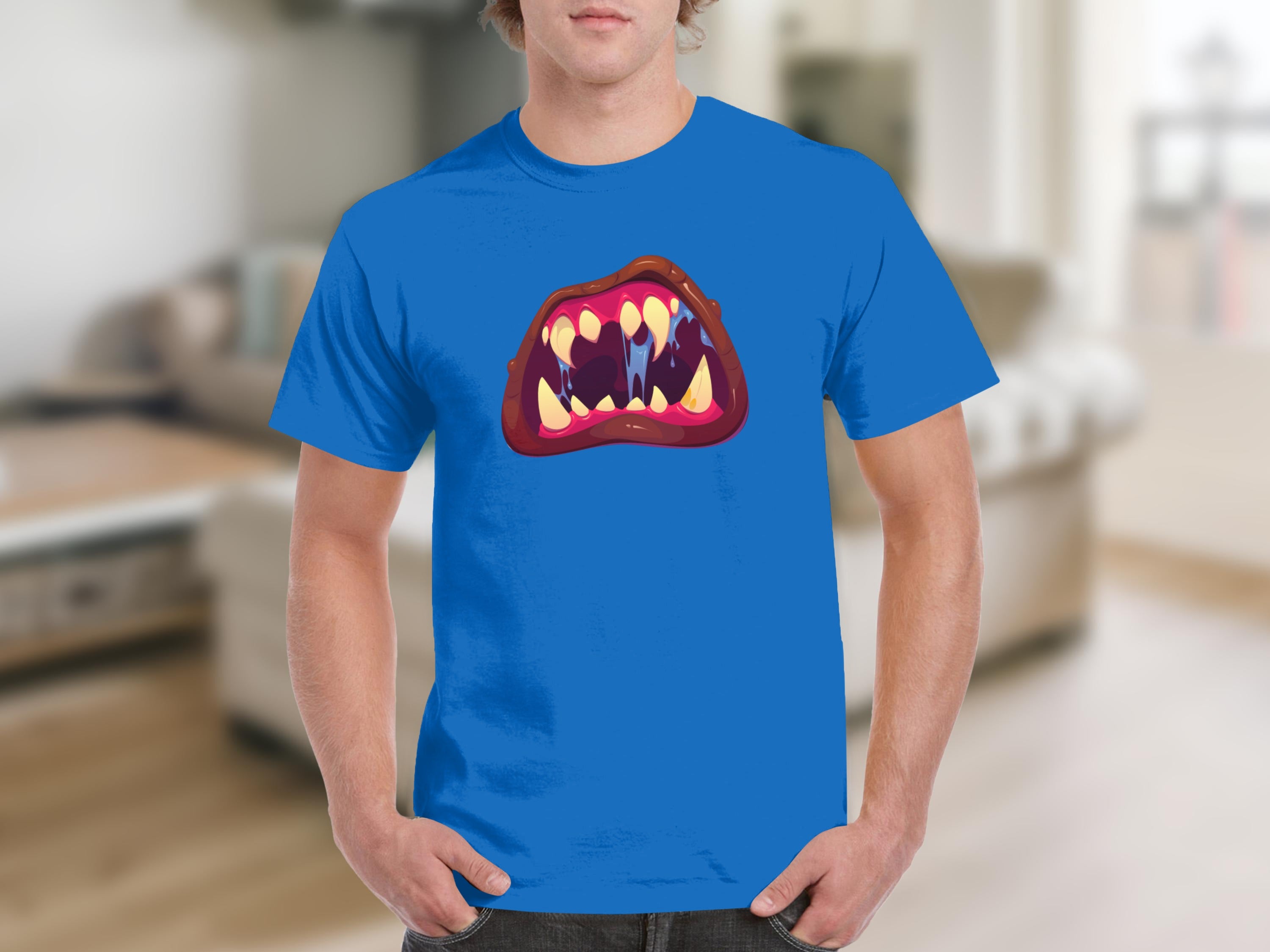 Blue t-shirt with an animated monster mouth and sharp teeth graphic.