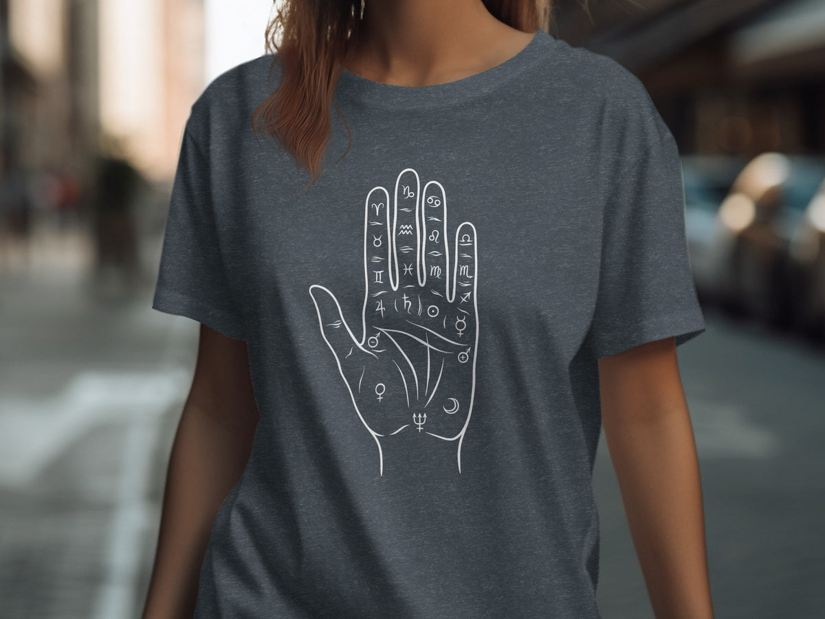 Dark grey t-shirt with a white outline of a palmistry hand and astrological symbols.