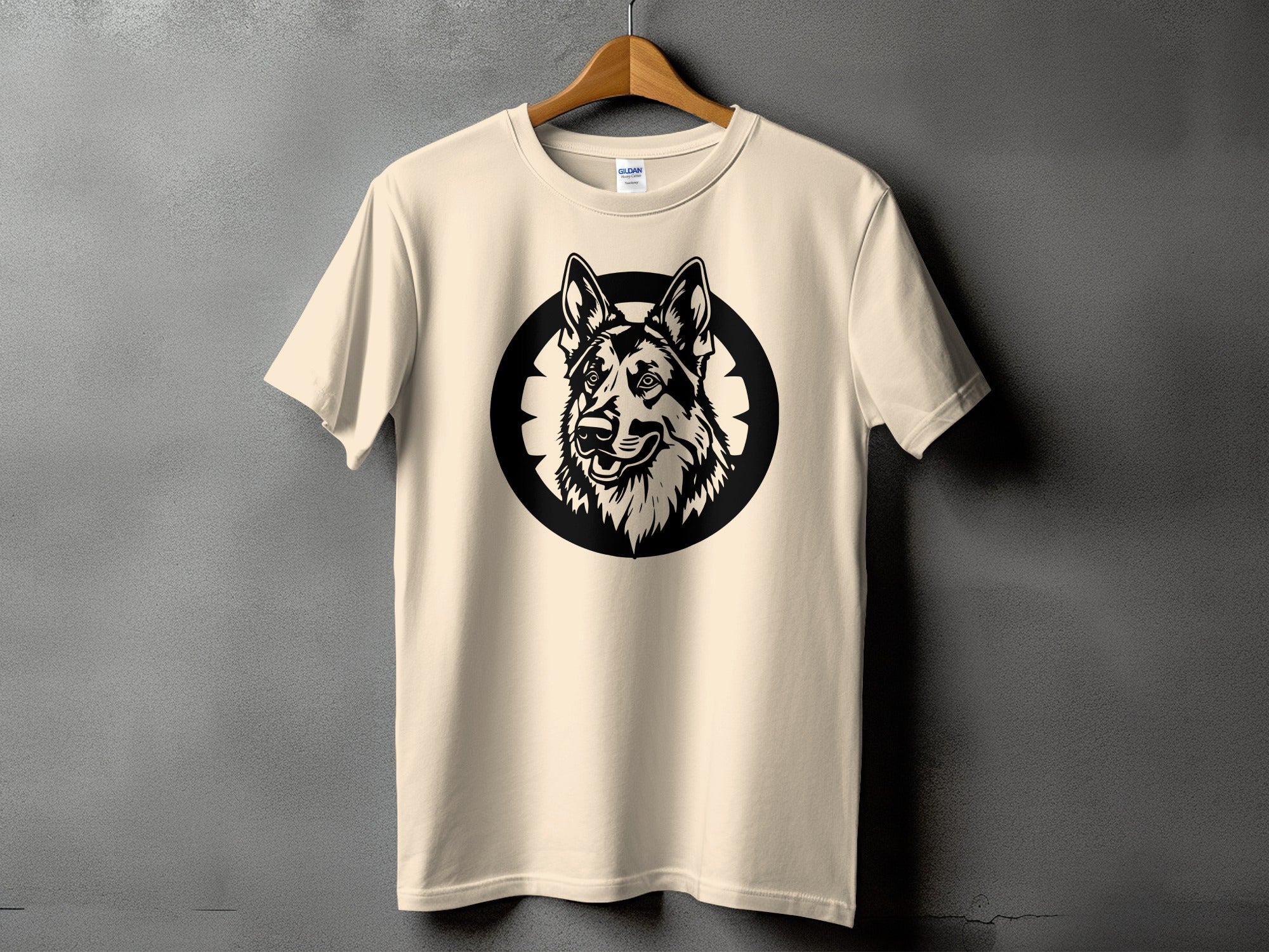 Cream t-shirt with a black German Shepherd head inside a circular emblem.
