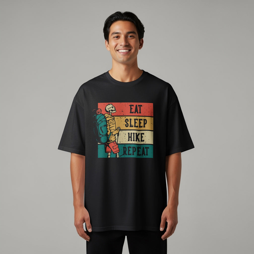 Skeleton hiker with backpack on black t-shirt, text Eat Sleep Hike Repeat.