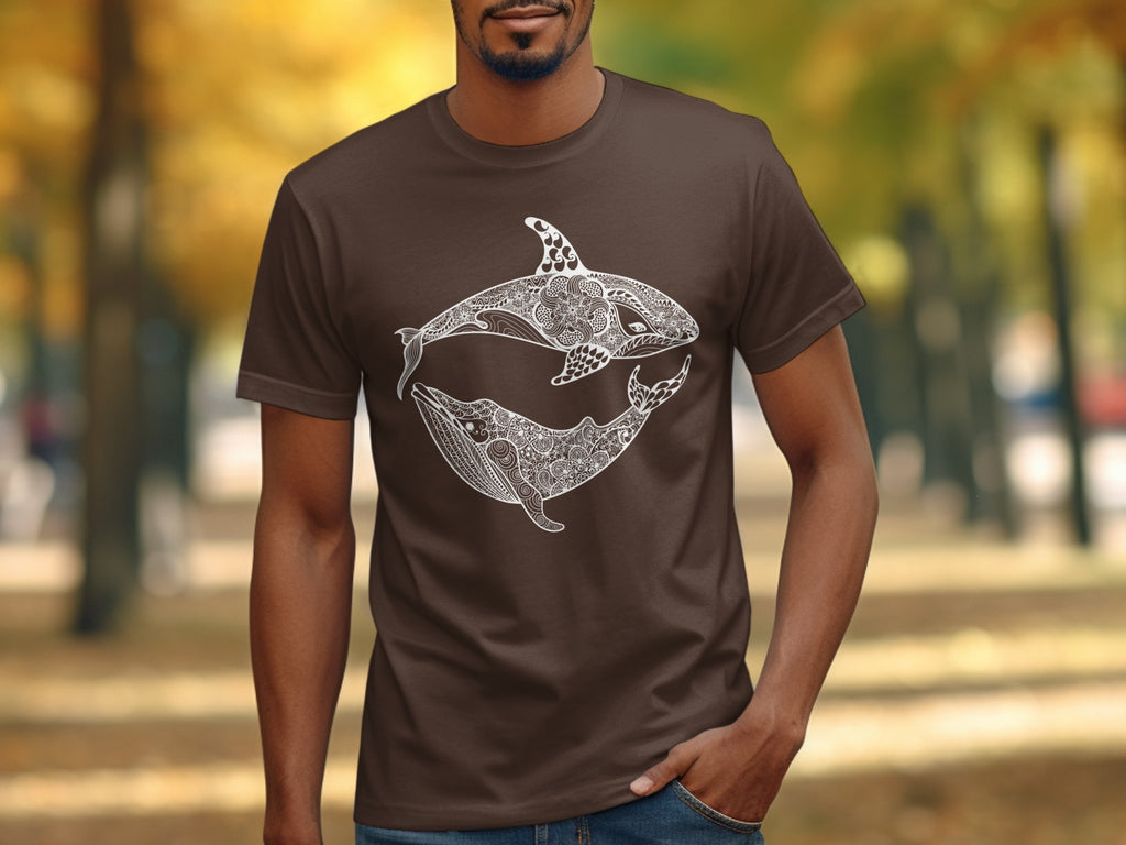 Brown t-shirt with white orca and whale mandala design on chest.